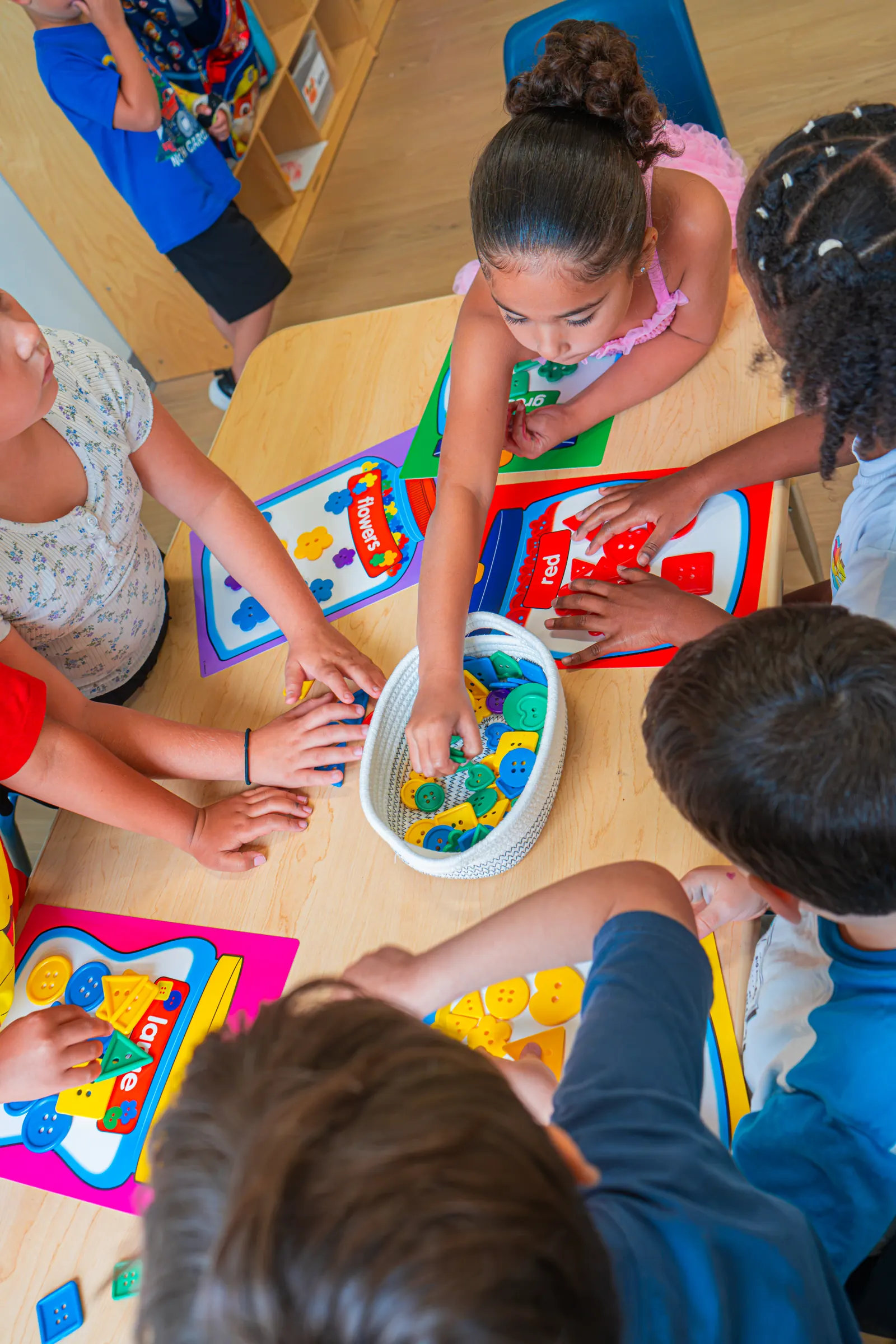 Children exploring a sensory bin together